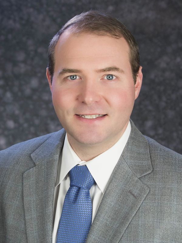 John T. DeRossett, Associate Attorney